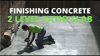 'Video thumbnail for Finishing Concrete For A Two Level Patio Slab (Stone Texture Finish)'