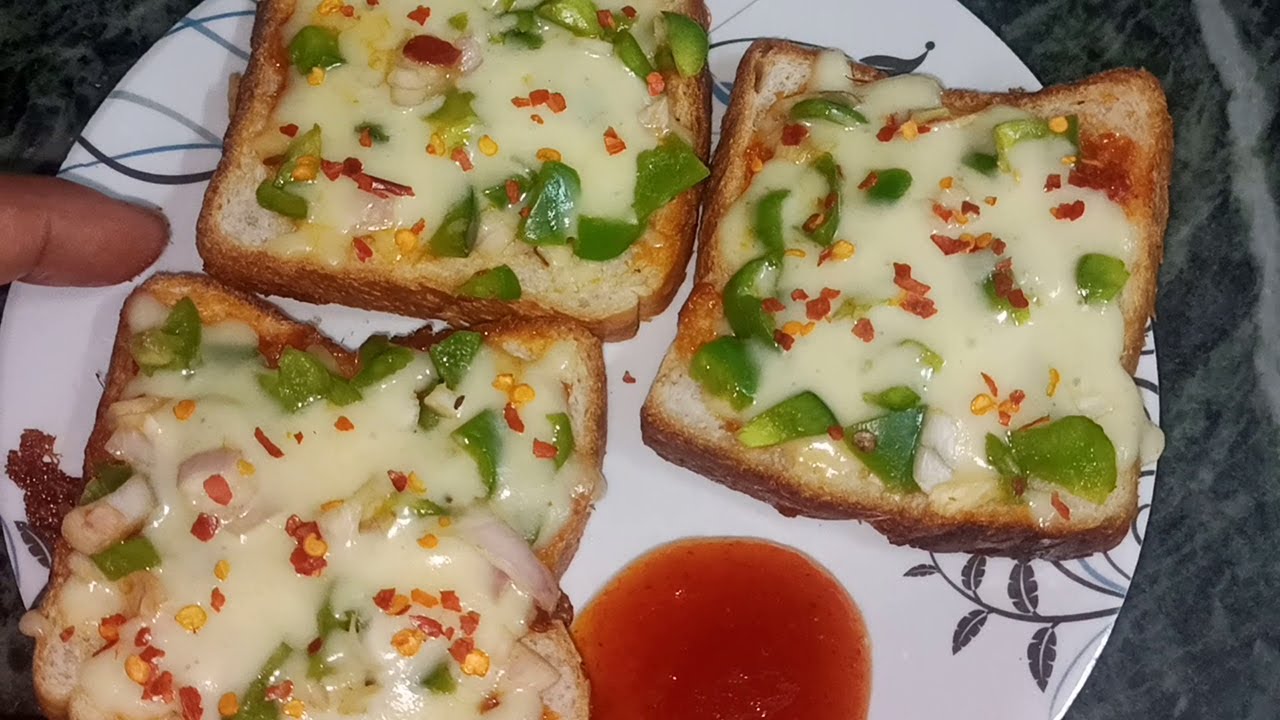 Video thumbnail for Bread Pizza Recipe / Instant Bread Pizza Recipe / How to Make Bread Pizza at Home / Pizza Recipe