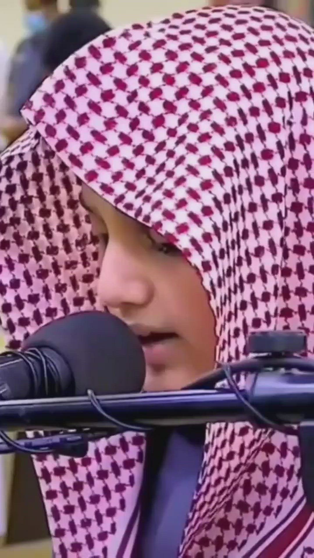 'Video thumbnail for young kid reciting quran while praying'
