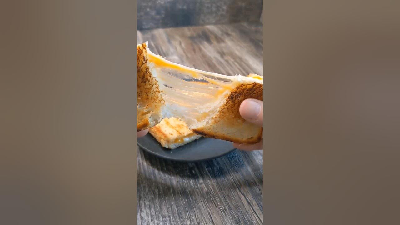 'Video thumbnail for Elevate Your Bread Game: Simple Cheese Sourdough Recipe! #youtubeshorts #breakfast #grilledcheese'