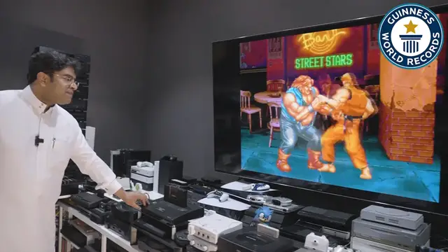 'Video thumbnail for 444 gaming consoles connected to one TV, a Guinness World Record'