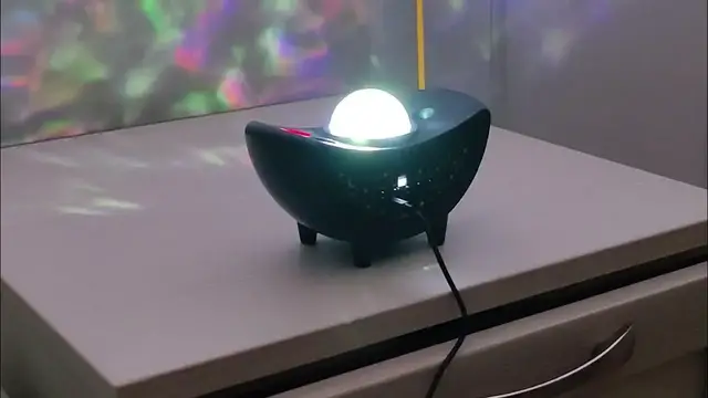 'Video thumbnail for Tiny Moon Shaped Projector with Bluetooth Speaker - KS1005A Demo'