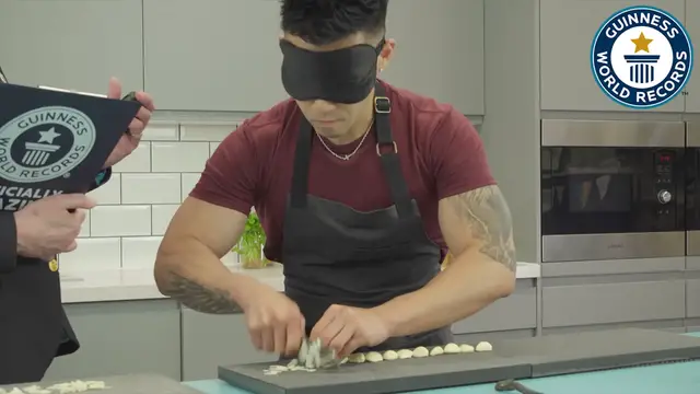 'Video thumbnail for Wallace sets garlic slicing record twice in one day'