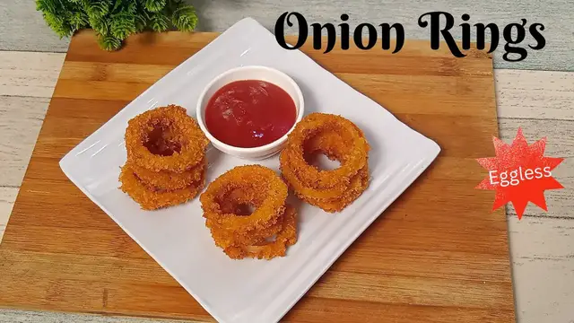 'Video thumbnail for Eggless Onion Ring Recipe I Crispy Homemade Onion Rings'