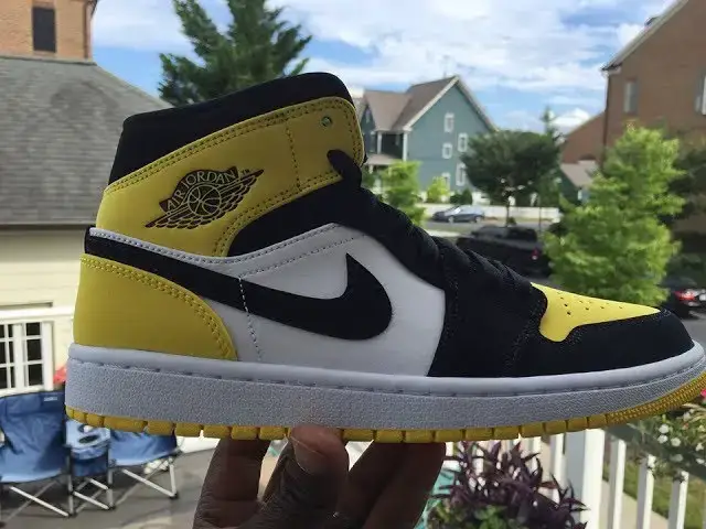 'Video thumbnail for Quick Look At The Air Jordan 1 Mid Reverse Yellow Toe - Buy It Now'