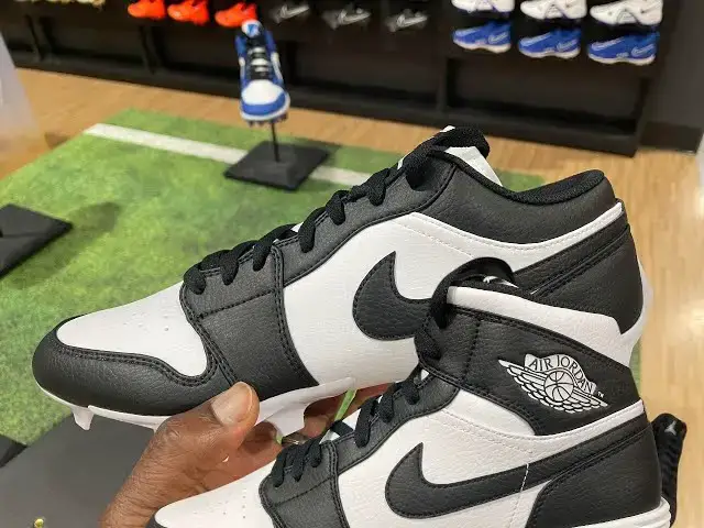 'Video thumbnail for Quick Look At the black & white Air Jordan 1 Low & Mid Cleats +Buy it now'