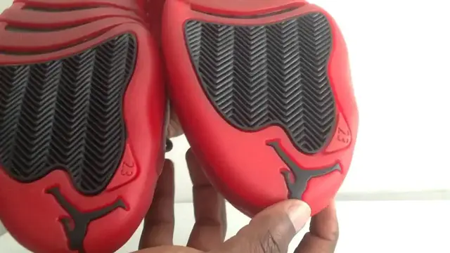 'Video thumbnail for Real VS Fake Unauthorized Air Jordan 12 XII Flu Game Black Red 2016'