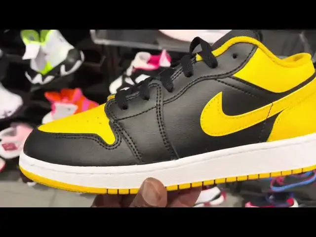 'Video thumbnail for The GS Air Jordan 1 low Yellow Ochre Screams The Wutang Clan'