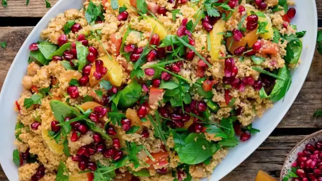 'Video thumbnail for Moroccan Couscous Recipe: A Taste of Tradition with Vegetables, Raisins and Fragrant Broth'