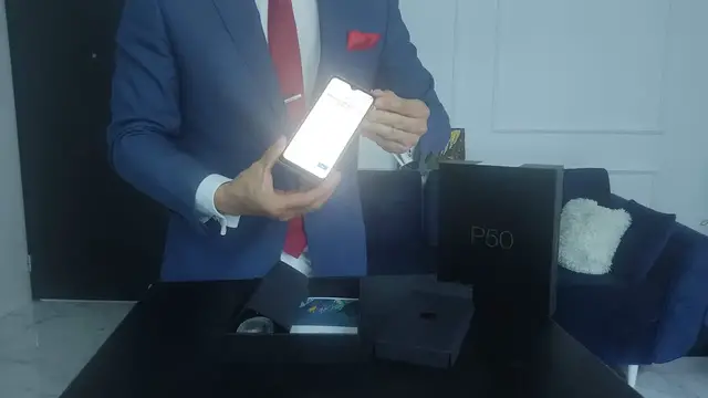 'Video thumbnail for Unveiling the CUBOT P50: A Business Professional's Secondary Device - A Classy Unboxing in Suit'