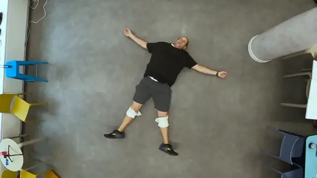 'Video thumbnail for Serial record breaker puts on t-shirts in record time'