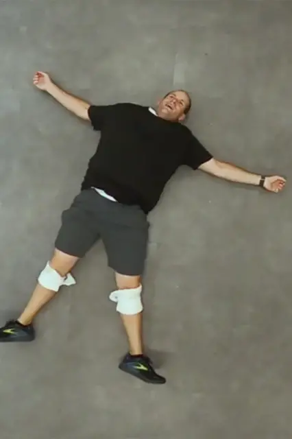 'Video thumbnail for Serial record breaker puts on t-shirts in record time'