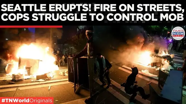 'Video thumbnail for Chaos in Seattle as Police Clash with Protesters Over ICE Raids'