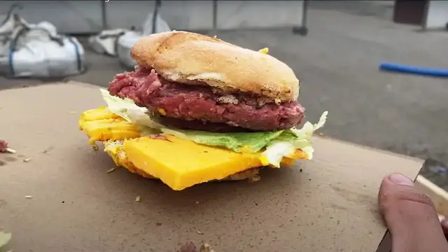 'Video thumbnail for DIY Chainsaw Grill: Smoked Hamburger Recipe'