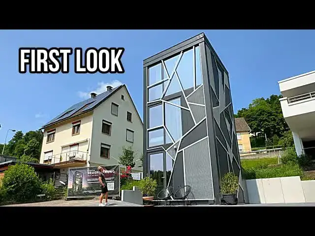'Video thumbnail for kerry tarnow: vertical prefab home tour! exploring modern architectural design in germany'