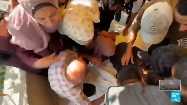 'Video thumbnail for Israeli fire killed dozens near aid centre, Gaza rescuers say'