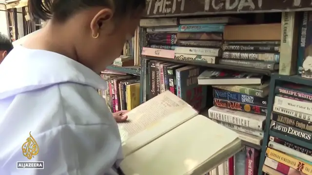 'Video thumbnail for Filipino retiree turns home into free library to battle Philippines literacy crisis'