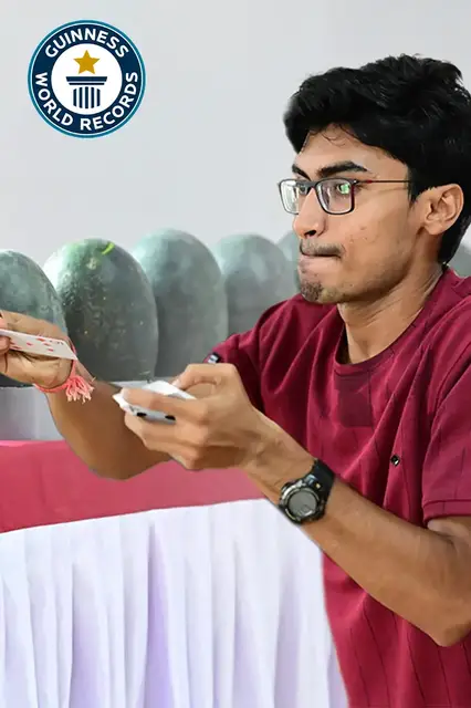 'Video thumbnail for Throwing playing cards into watermelons in record time'