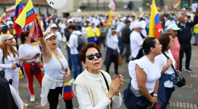'Video thumbnail for Colombians march in silence to protest political violence after senator's shooting'