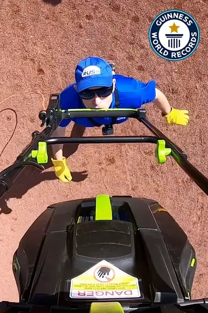 'Video thumbnail for Attempting world record for furthest distance walked with a lawnmower'