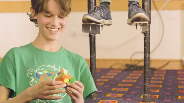 'Video thumbnail for Make-A-Wish kid has dreams come true as he sets cubing world record'