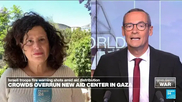 'Video thumbnail for Chaos erupts as thousands rush into Gaza's new US-backed aid centre'