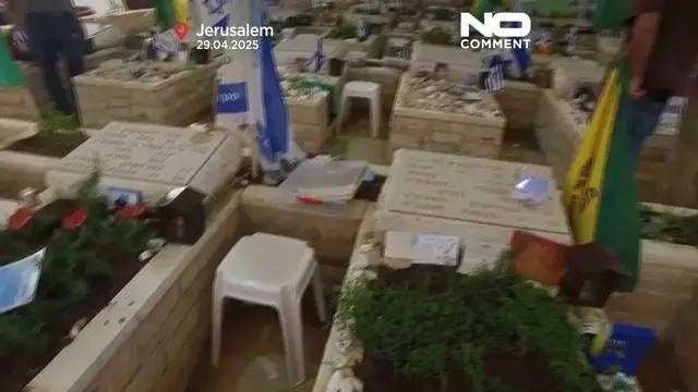 'Video thumbnail for Grieving relatives visit military graves before Israel's Memorial Day'
