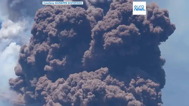 'Video thumbnail for Massive plume of ash and volcanic material billows above Mount Etna as it erupts again'