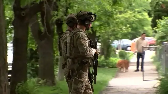 'Video thumbnail for Police search home linked to suspect in Israeli embassy staff shooting'