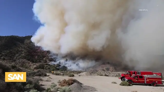 'Video thumbnail for Thousands evacuated as wildfires rage across Canada, US sends firefighters'