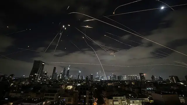 'Video thumbnail for Iran launches new missile strikes on Israel, killing 4 and Injuring dozens'