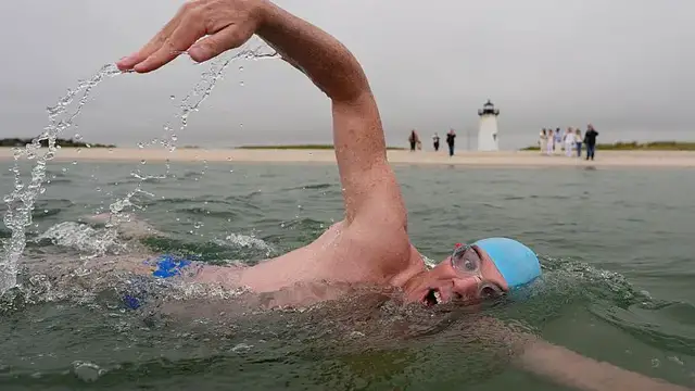 'Video thumbnail for Endurance athlete begins swim in shark-infested waters'