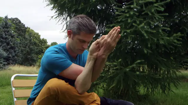 'Video thumbnail for Chair Yoga - Sitting eagle with forward bend'