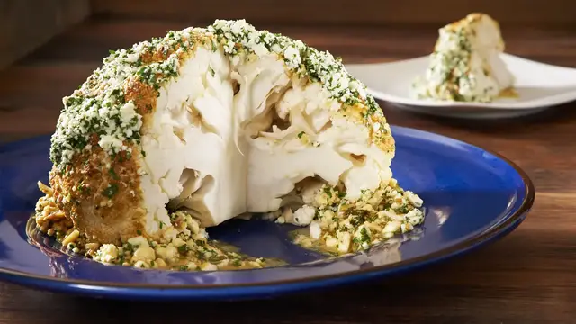 'Video thumbnail for Whole Roasted Cauliflower with Feta and Greek Honey'