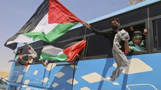 'Video thumbnail for Convoy of at least 1,500 activists heads to Gaza to challenge Israel's blockade'