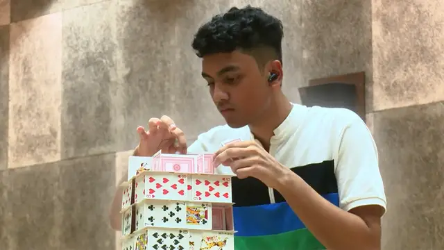 'Video thumbnail for Spending 24 hours to build a giant house of cards'
