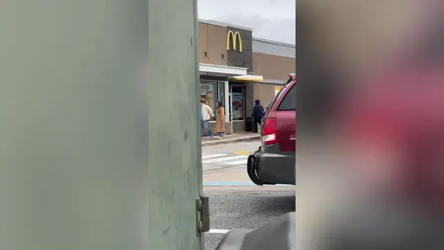 'Video thumbnail for Woman Who Loves McDonald's Has Surprise Proposal Beneath Golden Arches'