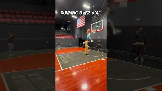 'Video thumbnail for (355) athletic feats: dunking and high jump over 6'4"'