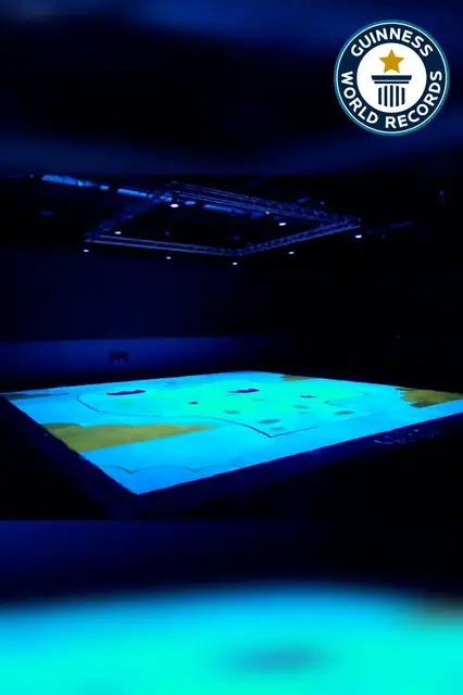 'Video thumbnail for Illuminating Mental Health, World's Largest Blacklight Painting for Charity'