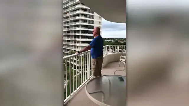 'Video thumbnail for Man Sings God Bless America From Balcony To Rapturous Applause | Happily TV'
