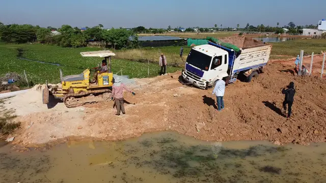'Video thumbnail for dozer pushing dump truck stuck'