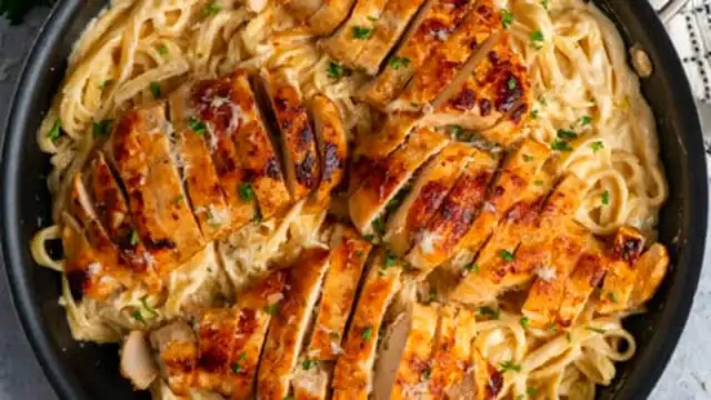'Video thumbnail for Garlic-Infused Chicken Alfredo_ A Comfort Classic'