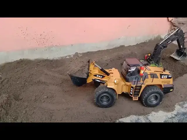 'Video thumbnail for RC Bulldozer Wheel Loader CAT  Working On Leveling The Land | BangSiagianID'