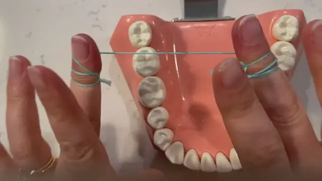 'Video thumbnail for C-Shape flossing technique'