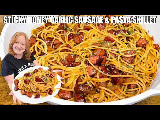 'Video thumbnail for STICKY HONEY GARLIC SAUSAGE PASTA SKILLET'