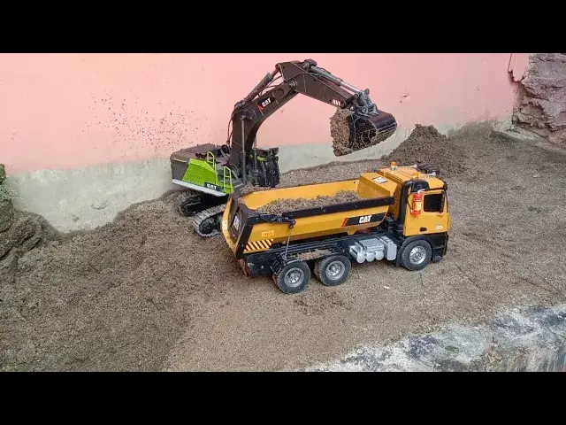 'Video thumbnail for RC Truck CAT Transporting Sand With RC Excavator CAT '