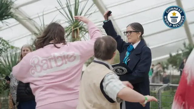 'Video thumbnail for Charity sets record for twirling relay'
