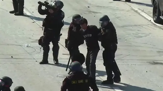 'Video thumbnail for WATCH: Los Angeles riot police clash with demonstrators in mass protest against immigration crackdown'