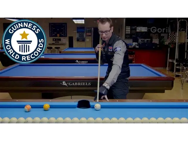 'Video thumbnail for Jump shot tutorial: Record-breaking pool trick shot star Florian Kohler shows you how!'