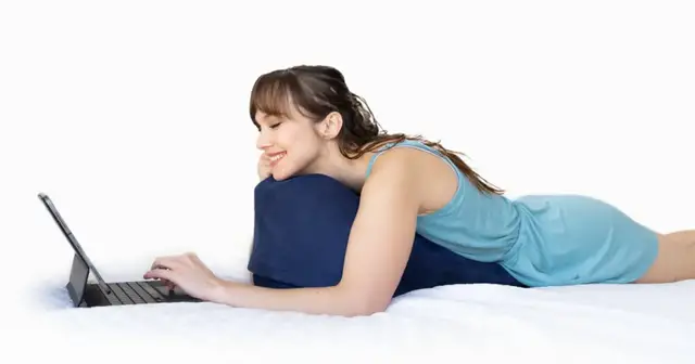 'Video thumbnail for Prone Cushion The Ergonomic Cushion for Lying on Your Stomach'